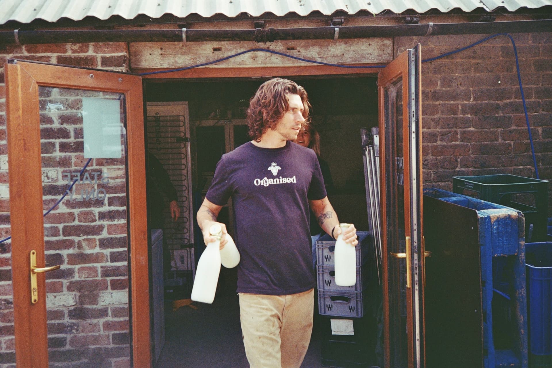Organised farmer carrying fresh raw milk