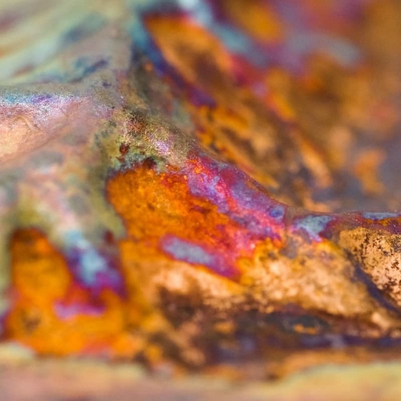 Copper with an iridescent patina, close up