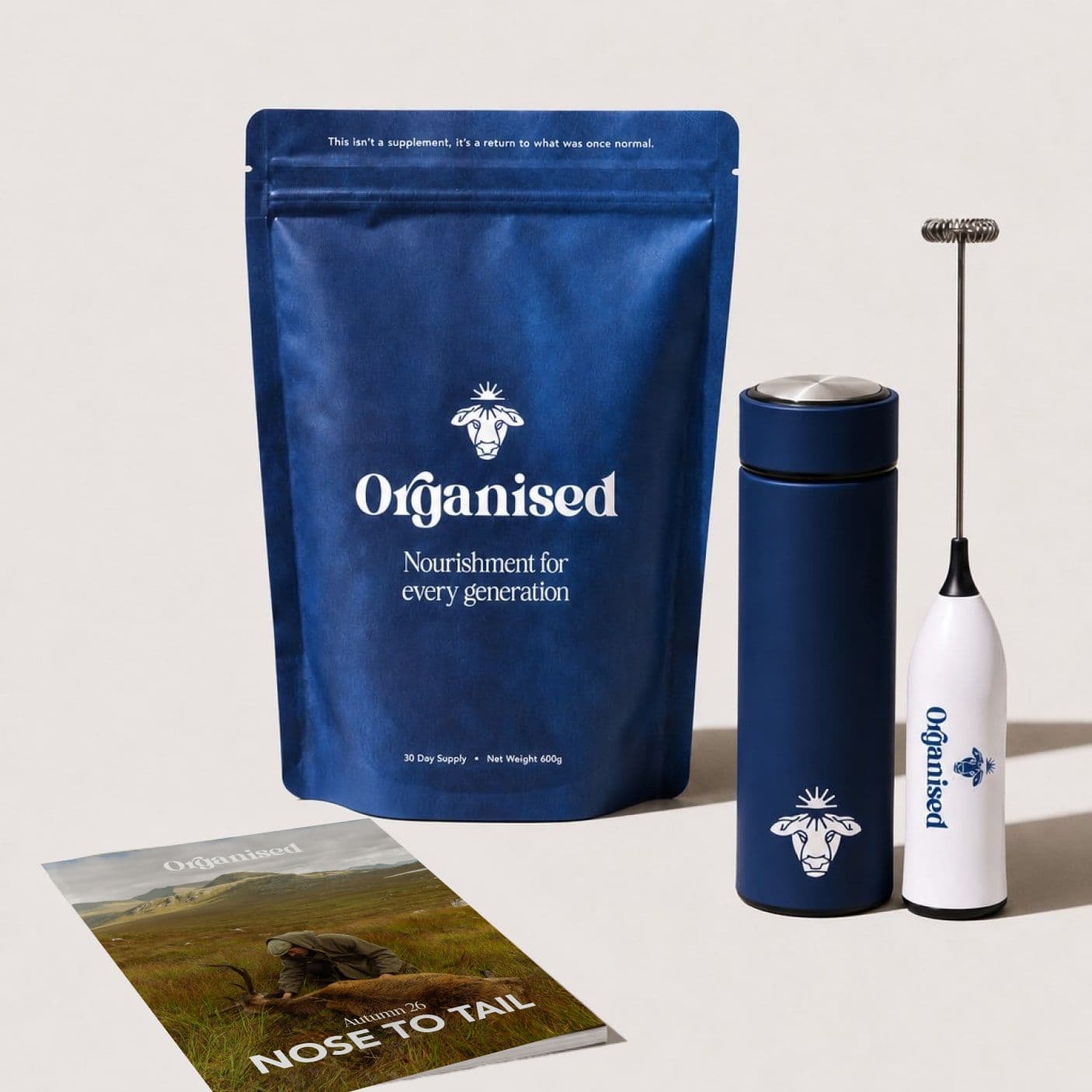 The Organised pouch with the steel bottle, electric whisk and seasonal zine
